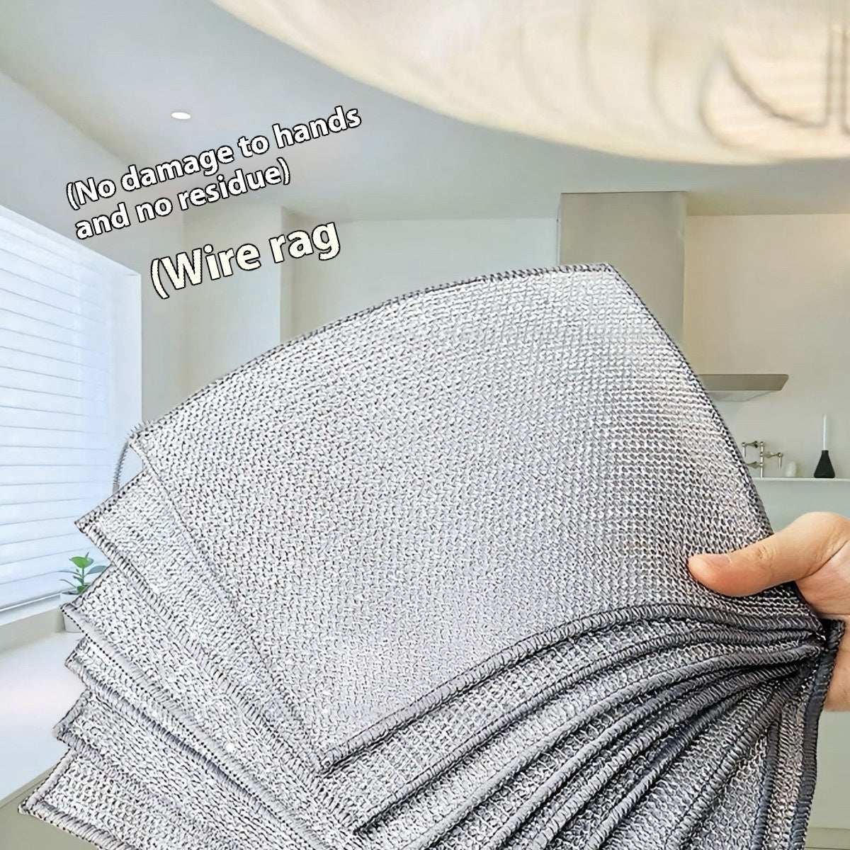 Metal Wire Cleaning Cloth in silver with a fine woven wire texture shown in a fan spread, highlighting smooth edges and hand-held display